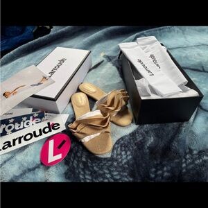 LARROUDÉ designer slippers
Ivy Ruffle Flat Mule In Beige Raffia Size 6